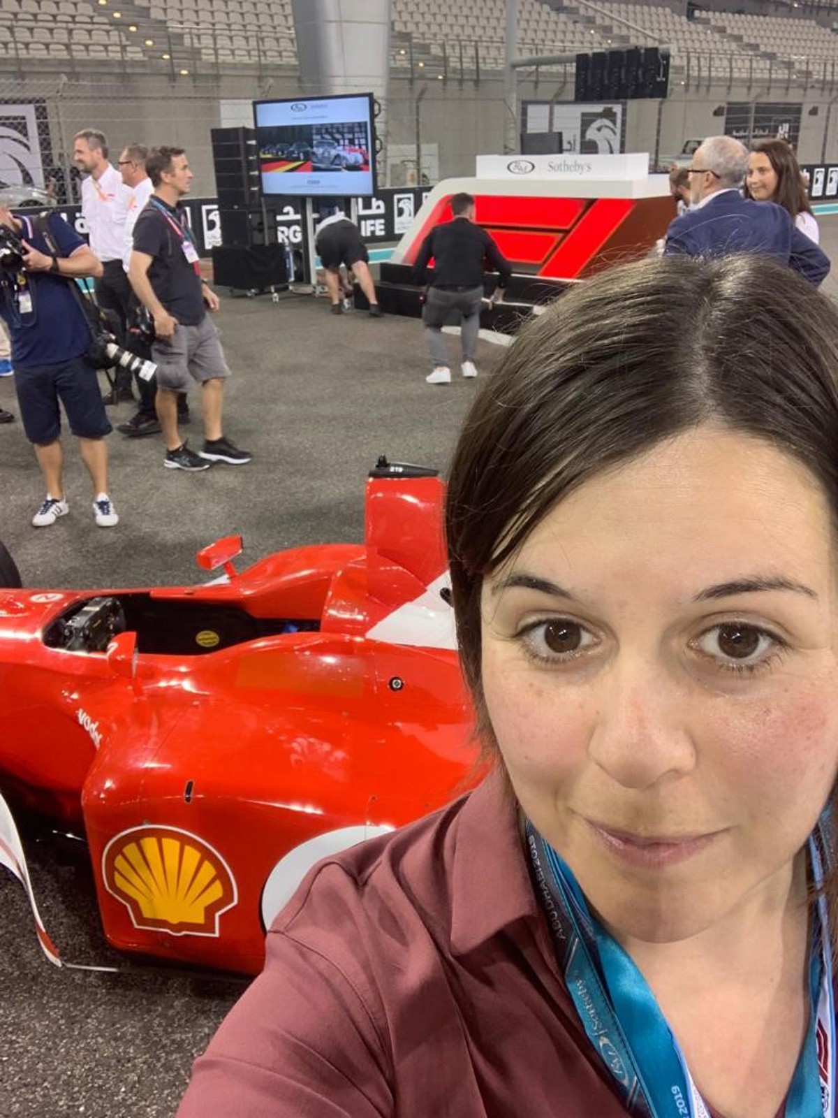 Bess Walker RM's Auction Administration Manager Europe with Schumacher Ferrari F2002 at Abu Dhabi in 2019