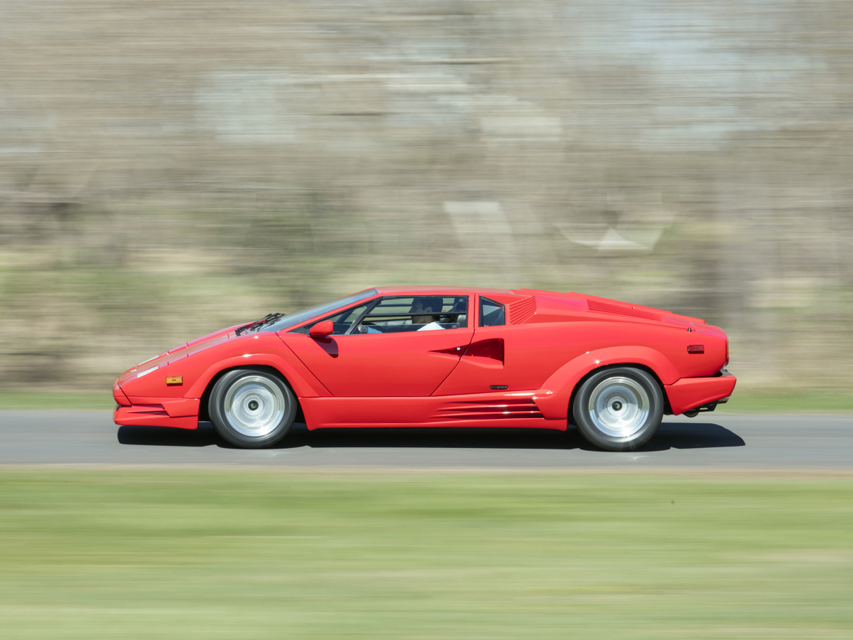 Michael Caimano at speed in a classic Lamborghini