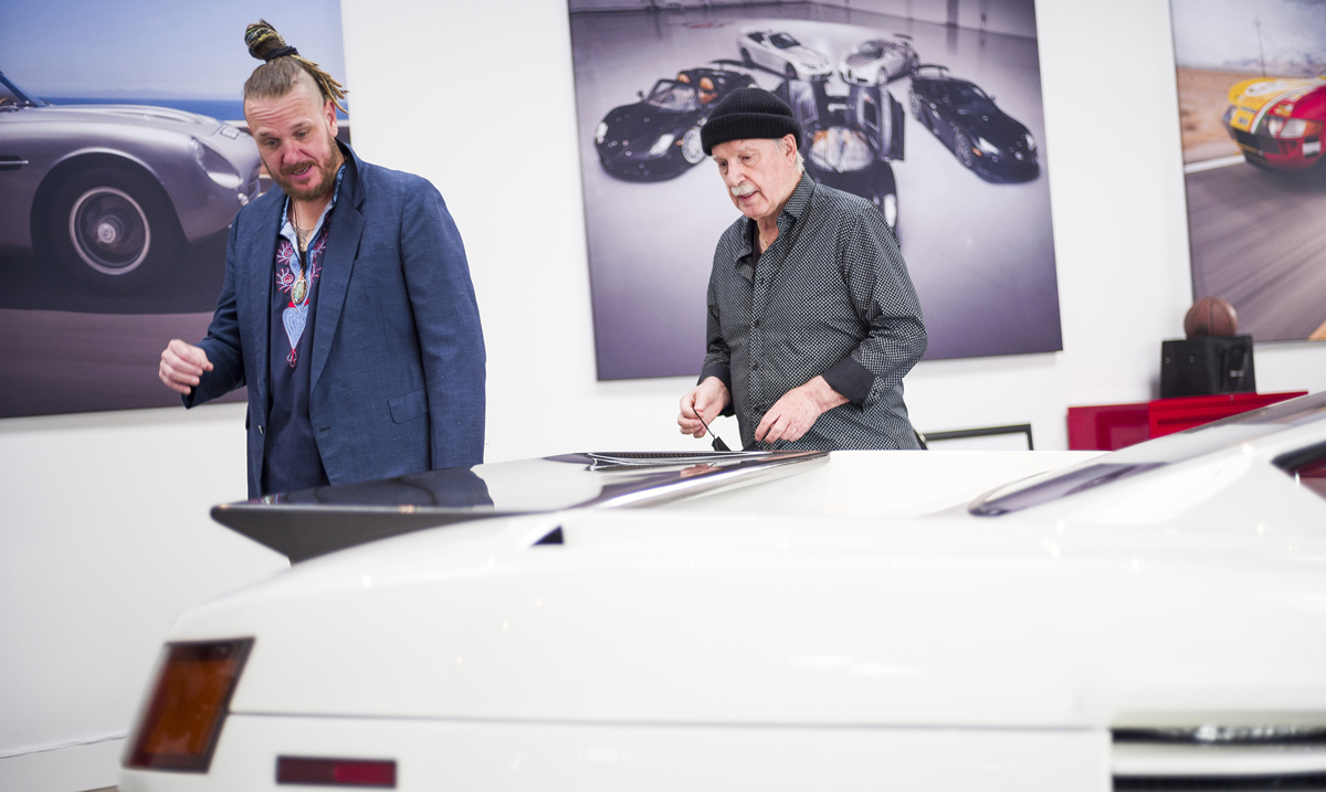 Thomas and Moroder walking around the Cizeta-Moroder V16T offered at RM Sotheby's Arizona live auction 2022