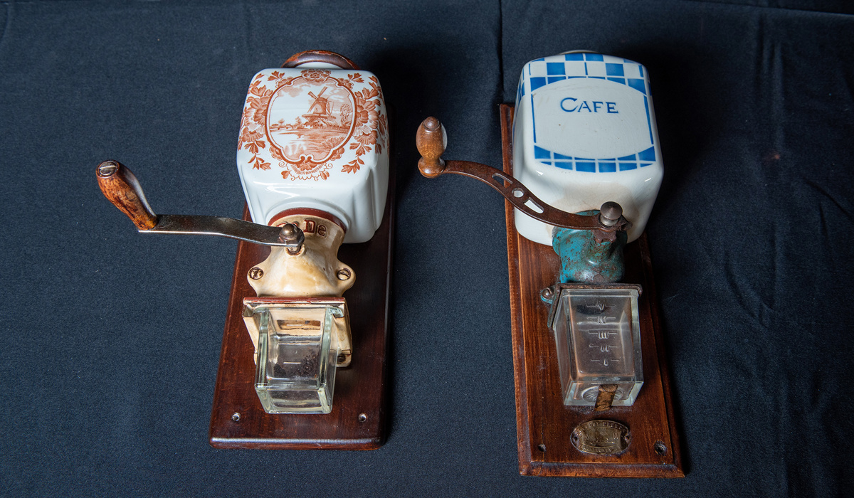 Pair of Porcelain Wall Mounted Coffee Grinders offered at RM Sotheby's Open Roads February 2022 online auction