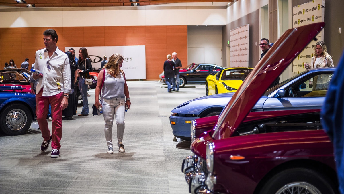 Spectators viewing lots on display at RM Sotheby's Live Monterey Auction Preview 2021