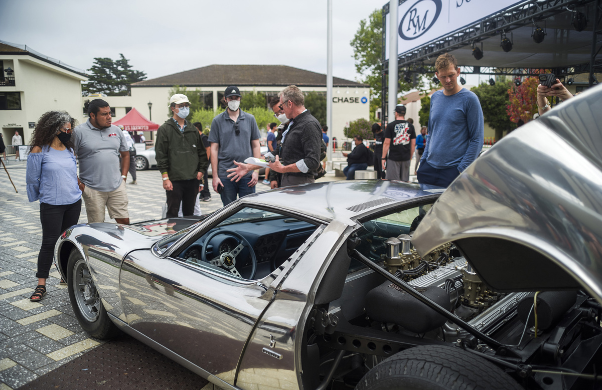 Spectators viewing lots on display at RM Sotheby's Live Monterey Auction Preview 2021