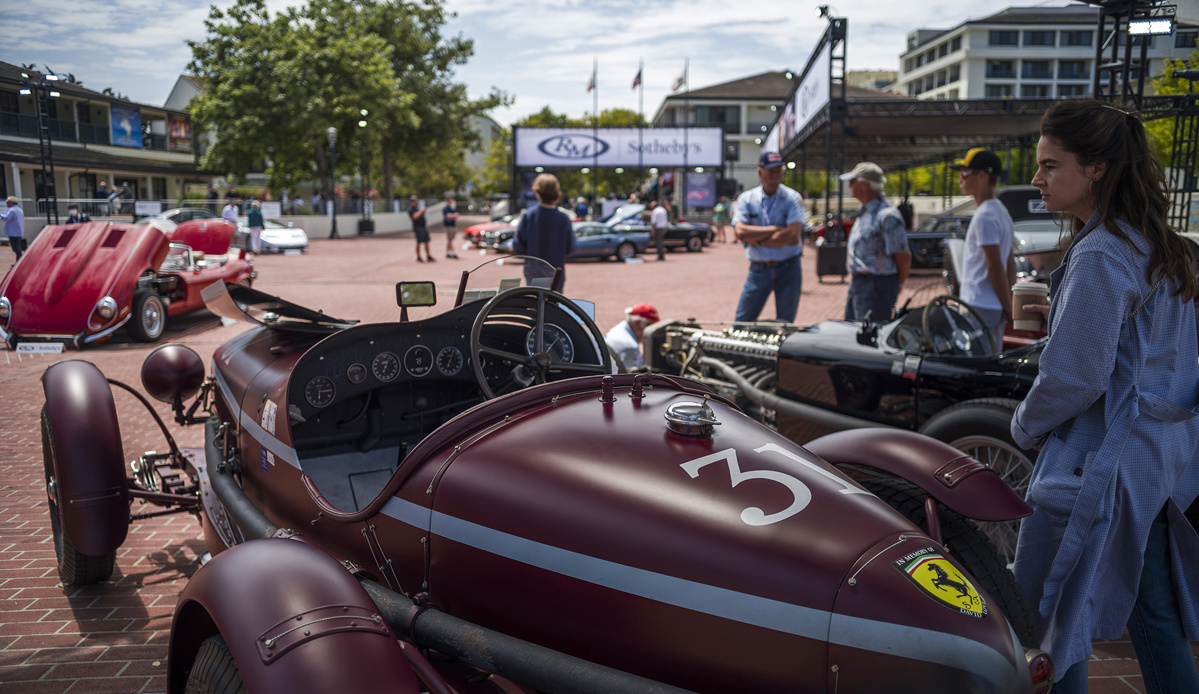 Spectators viewing lots on display at RM Sotheby's Live Monterey Auction Preview 2021