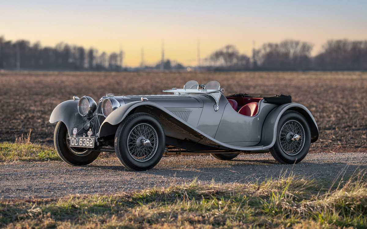 Gunmetal over a red interior 1938 SS 100 Jaguar 3½-Litre Roadster available at RM Sotheby’s Arizona Live Auction 2021