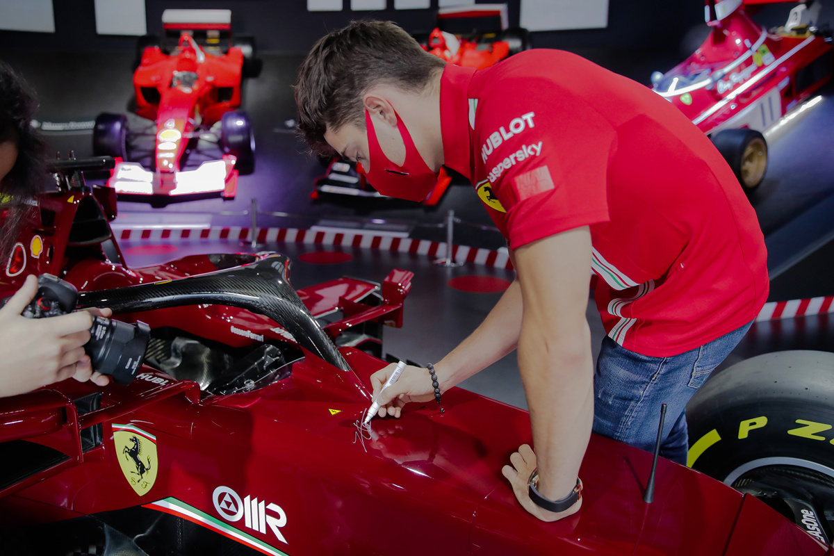 Charles Leclerc signing the Ferrari SF1000 Show Car